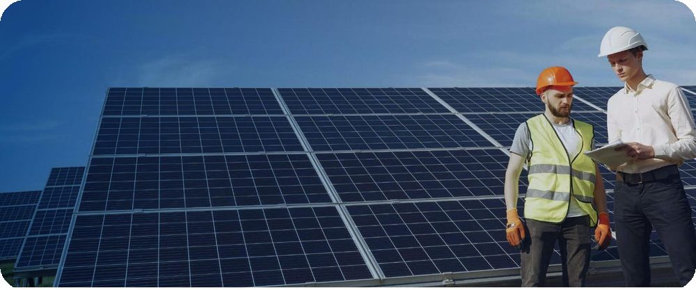 Auric Energy engineers inspecting a rooftop solar installation